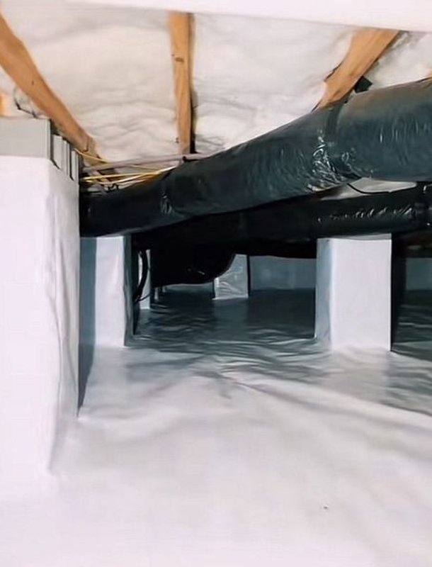 Fiberglass insulation in a crawl space
