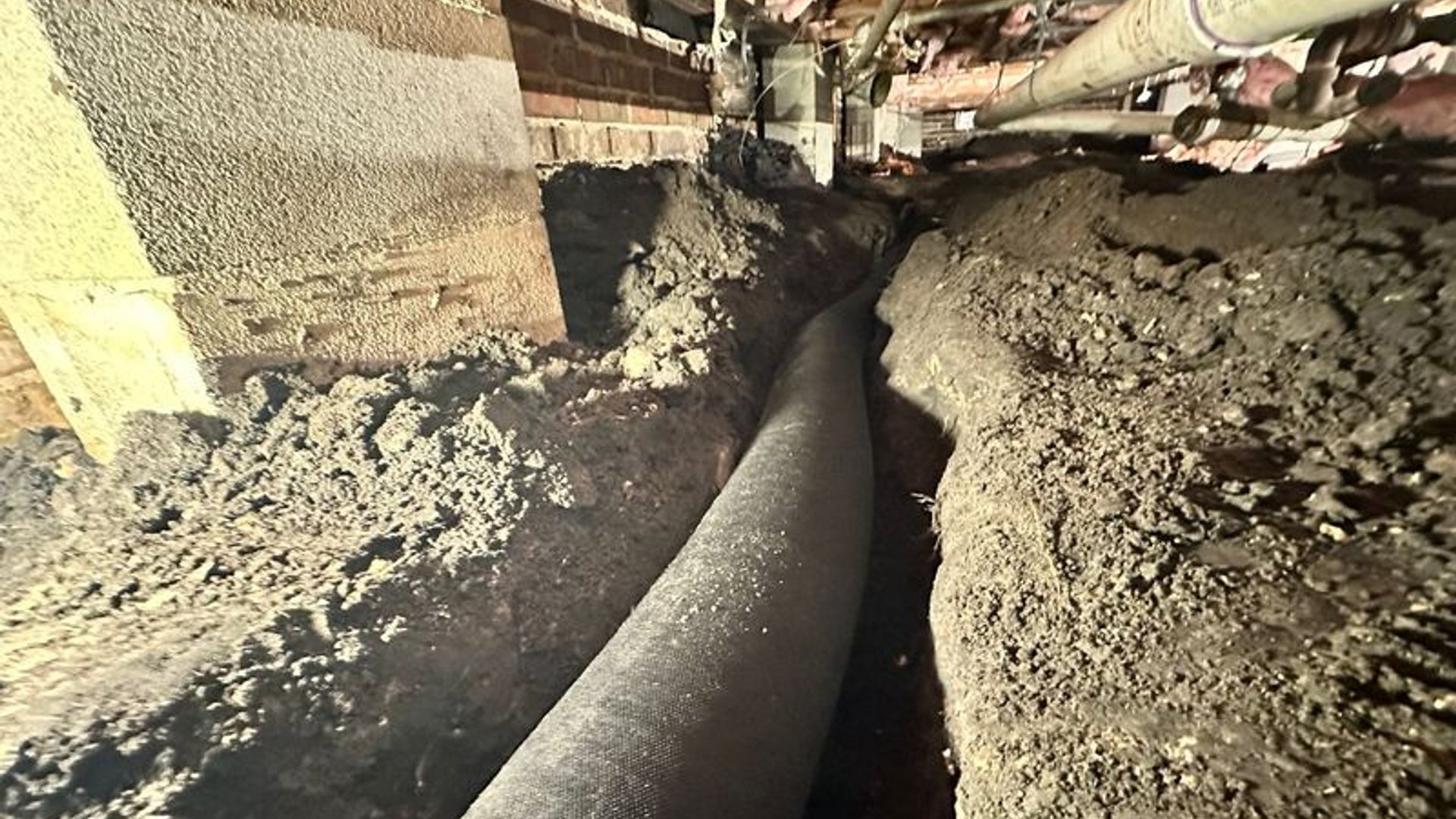 Interior crawl space water management system installed by RNL